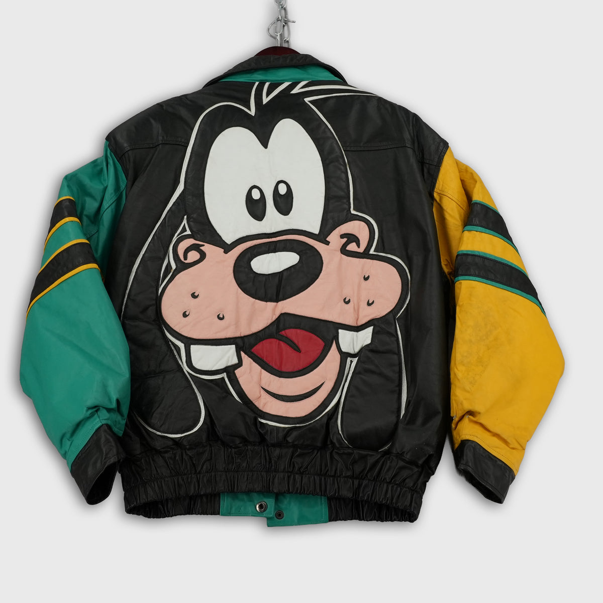 Vintage Disney World Goofy leather racing jacket, green and yellow, size M